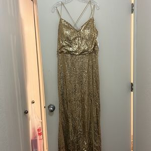 Gold shiny mother of the bride dress very elegant.